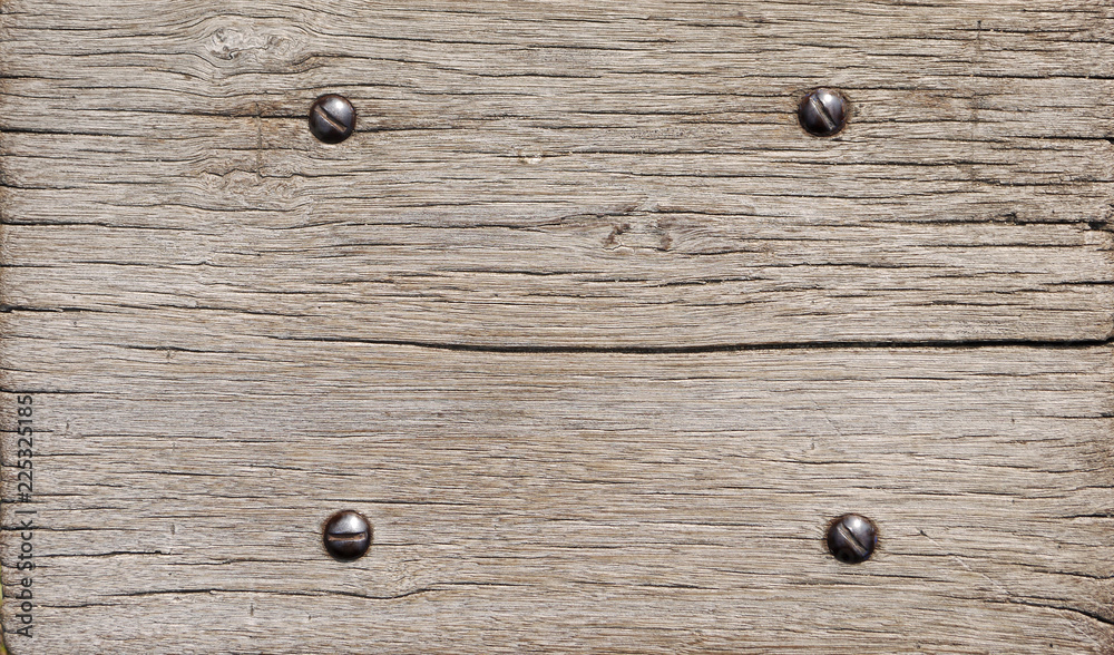 Rusty Bolts on Wooden board Rusty Bolts on Wooden board