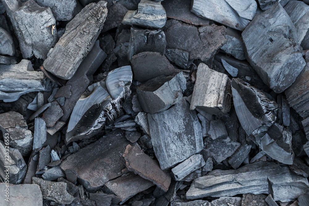 Black charcoal background texture copy space, close-up Black charcoal background texture copy space, close-up