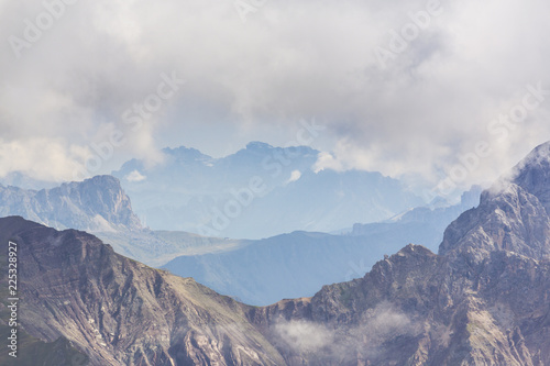 Beautiful summer scenery in the Dolomite Alps, Italy, with dramatic storm clouds