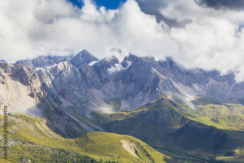 Beautiful summer scenery in the Dolomite Alps, Italy, with dramatic storm clouds