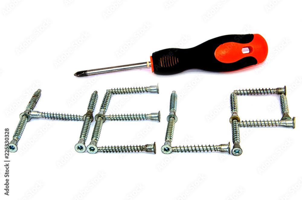 Screwdriver and small metal screws on a white background Screwdriver and small metal screws on a white background