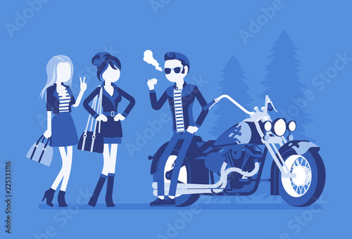 Cool rocker boy in a biker leather jacket