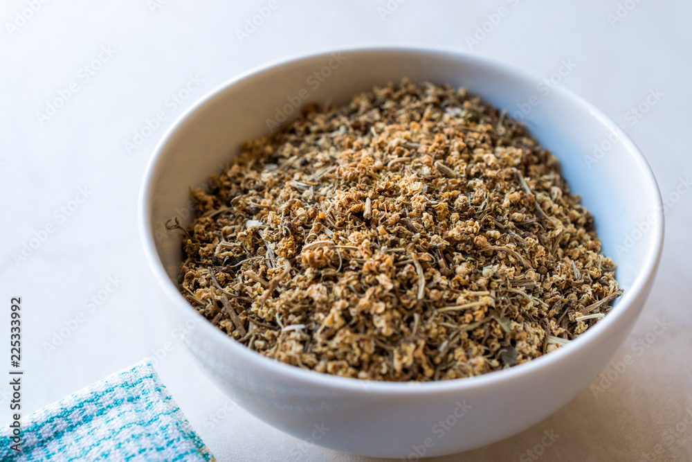 Dried Elderflower (Sambucus) / Dry Elderberry in Ceramic Bowl. Dried Elderflower (Sambucus) / Dry Elderberry in Ceramic Bowl.
