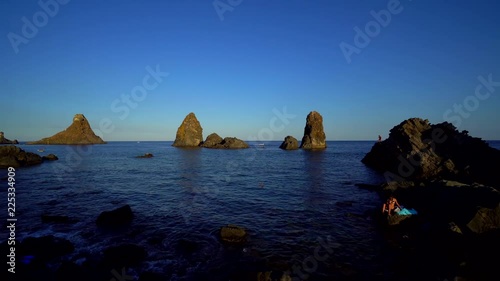 The stacks of Aci Trezza, Sicily, Italy. photo