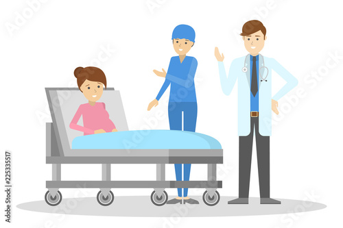 Happy pregnant woman lying in hospital bed