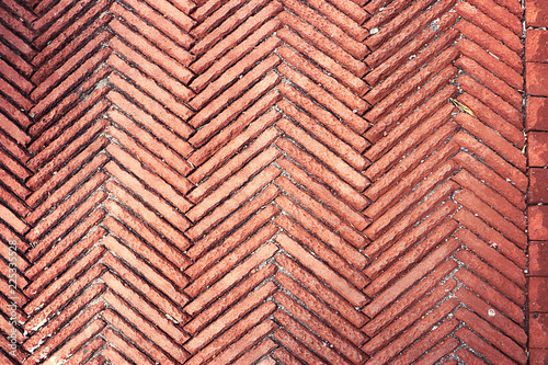 pavement texture, herring-bone tiles of cotto bricks for outdoors photo