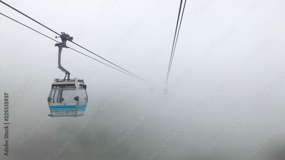 ngong ping cable car hong kong china in the rainy season and fog ngong ping cable car hong kong china in the rainy season and fog
