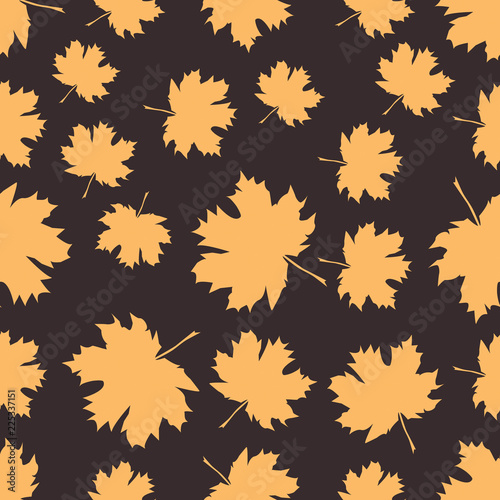 Seamless pattern with autumn maple leaves.  Golden yellow leaves on dark background. Vector illustration