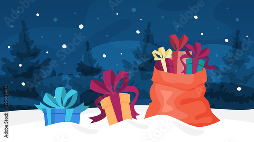 Christmas gift and red bag lying in the snow