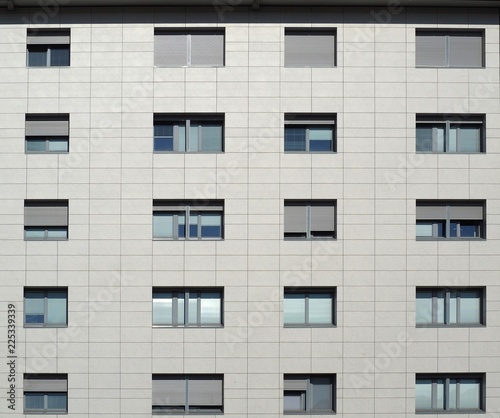 Photography Modern silver gray aluminum ventilated facade with dark gray windows