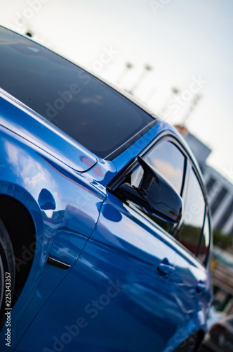 blue car, close-up
