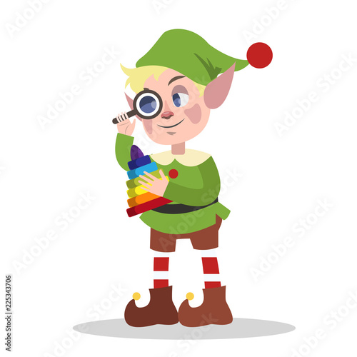 Cute christmas elf in green clothes making toy