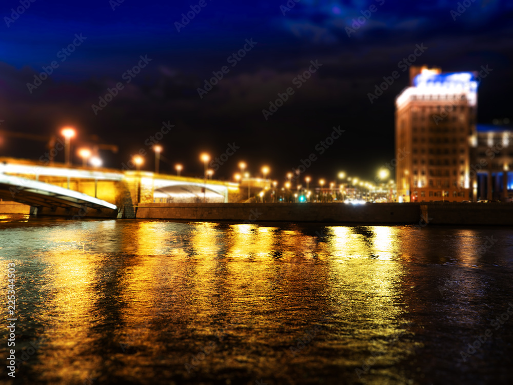 Night Moscow bridge with dramatic lightning background