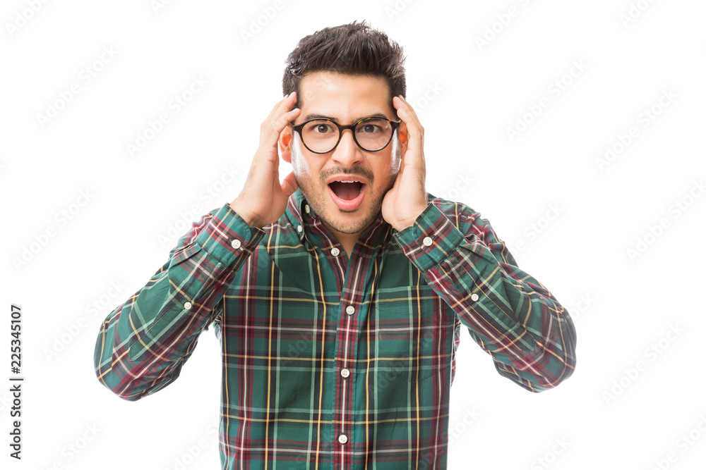 Shocked Man Touching Face Over White Background Shocked Man Touching Face Over White Background