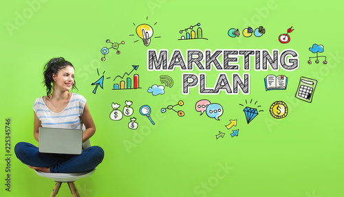 Marketing plan with young woman using a laptop computer 