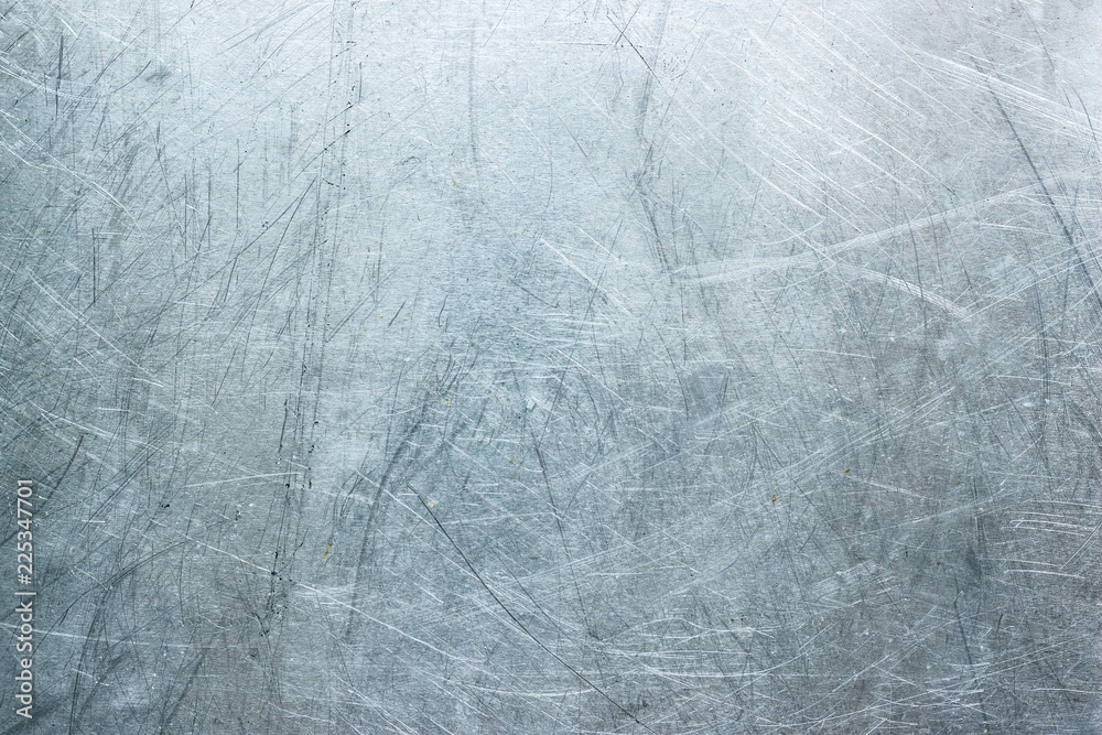 Fototapeta premium Texture of stainless steel wallpaper, background of metal with scuffs