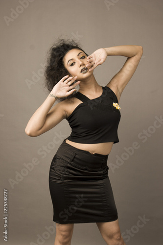 pretty female model in black skirt