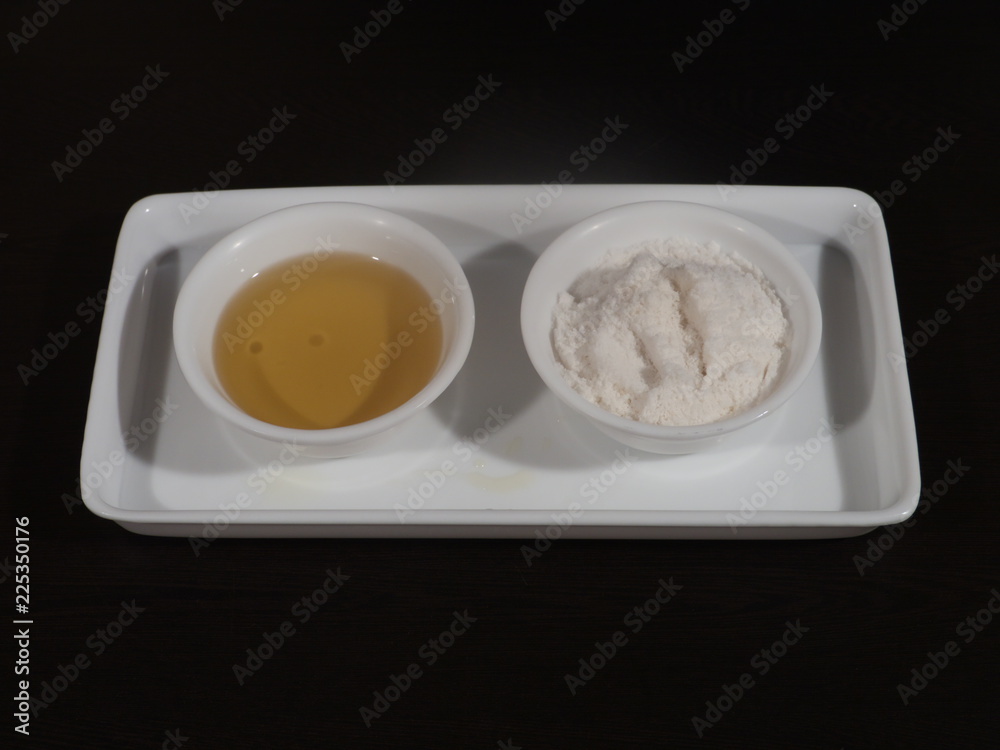 White sea salt isolated on Wooden background,Olive oil on a wooden background, Salt and Olive Oil in White Bowl on Wooden Background, bowl of fresh olive oil and Salt on Wooden Background White sea salt isolated on Wooden background,Olive oil on a wooden background, Salt and Olive Oil in White Bowl on Wooden Background, bowl of fresh olive oil and Salt on Wooden Background