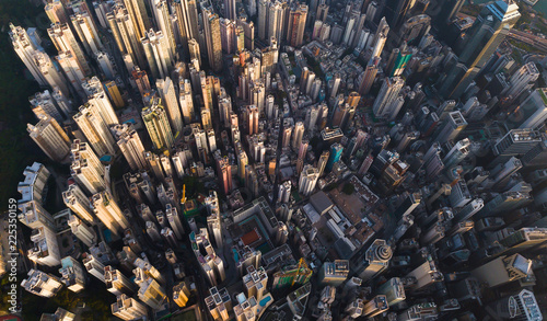 Aerial view of Hong Kong Downtown. Financial district and business centers in smart city in Asia. Top view of skyscraper and high-rise buildings.