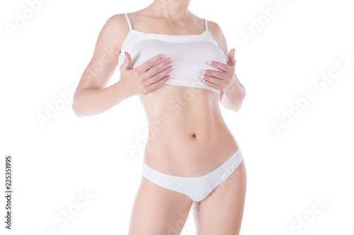 Female cropped fit body in white base underwear, isolated on white. © junky_jess