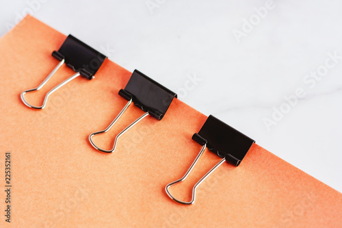 Binder clip binding sheets ...