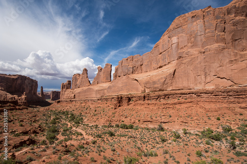 Park Avenue Viewpoint in Arches National Park in Utah on a cloudy sunny day © MelissaMN