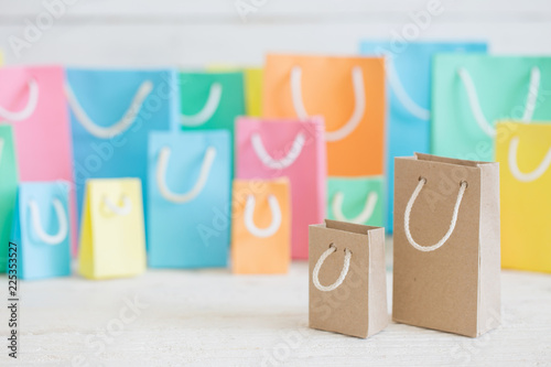 paper bags on wooden background