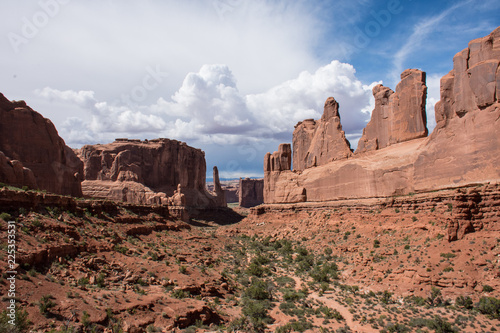 Park Avenue viewpoint in Arches National Park on a partly cloudy summer day