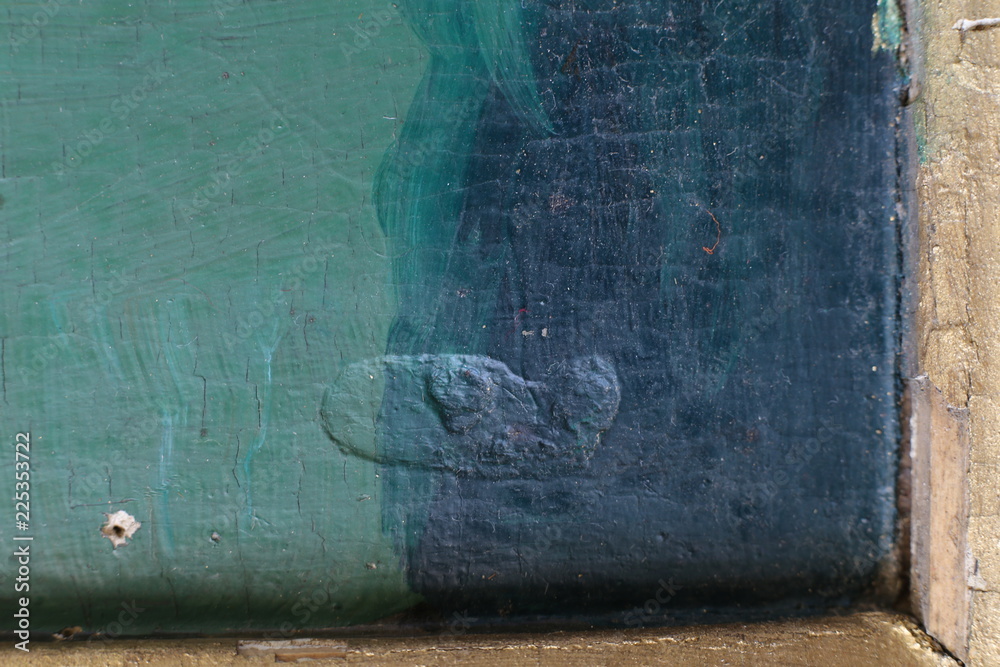 Fototapeta premium Restoration: close up of a painting final retouch