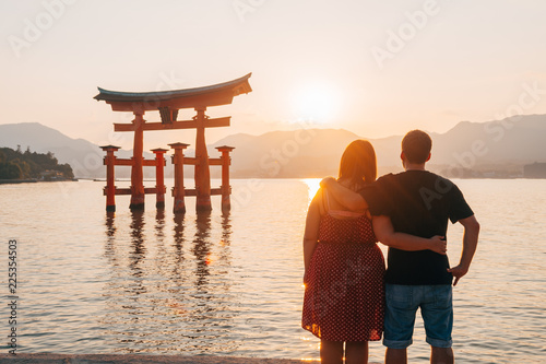 amazing sundown view to miyajima floating torii, Japan photo