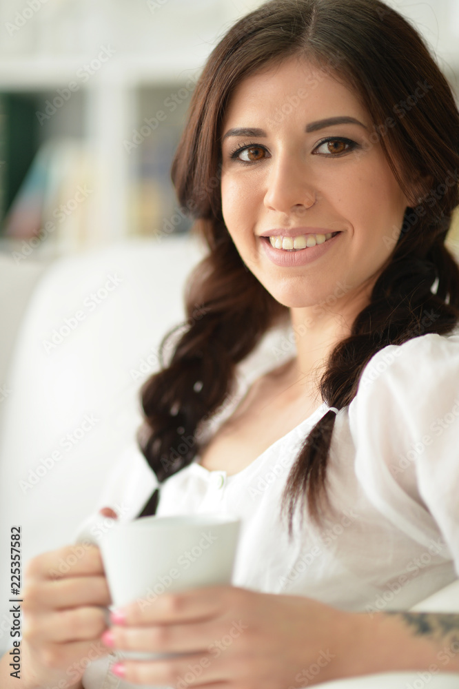 Portrait of young woman posing in home interior Portrait of young woman posing in home interior