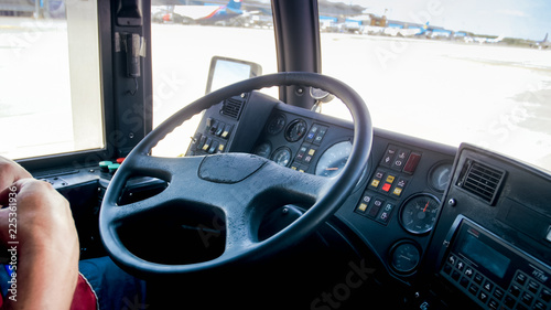 View from the inside on bus driving to the airplane on airport runway