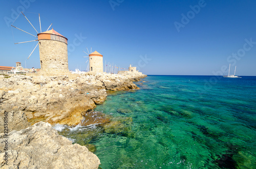amazing view on windmill and azure sea in Rhodes town, Greece