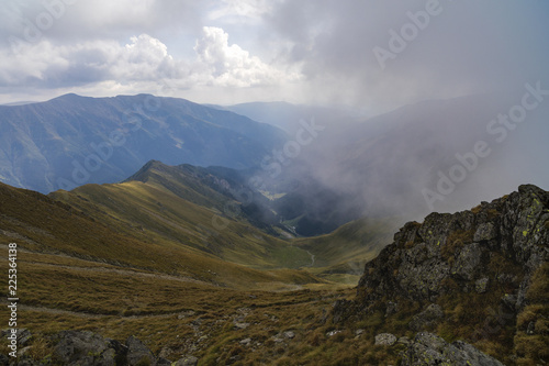 Landscape with rocky mountain peaks in summertime