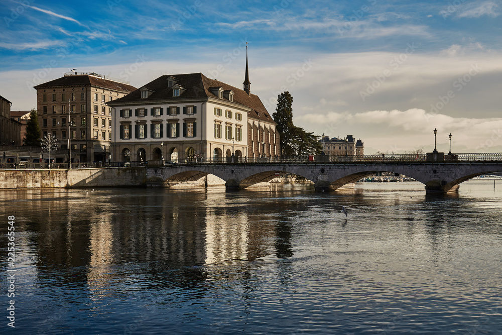 Obraz premium View of historic city of Zurich. Munsterbucke bridge crossing river Limmat, Canton of Zurich, Switzerland
