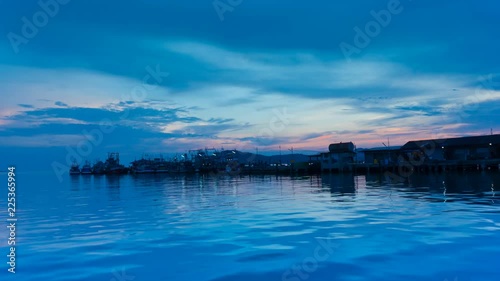  Thai traditional fishing boats are parking at jetty (Sattihip Bay) in a evening day