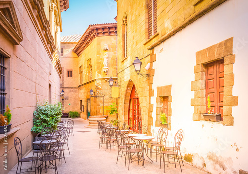 Poble Espanyol street, traditional architecture site in Barcelona, Catalonia Spain, toned © neirfy