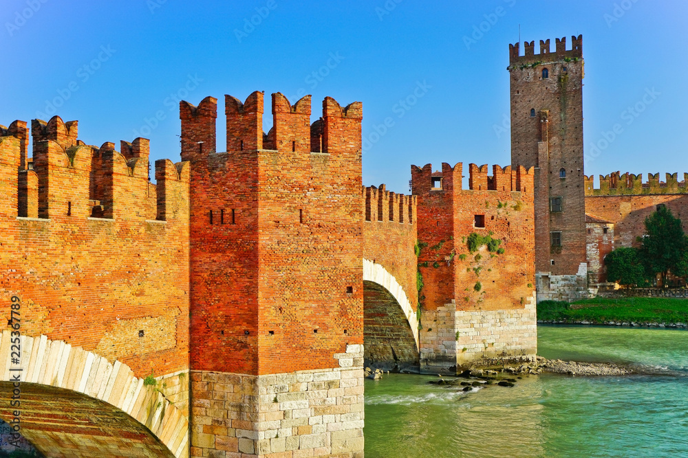 View of the Castel Vecchio Bridge connected to Castelvecchio Castle along Adige river in Verona, Italy.