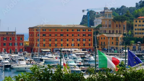 italian european genoa flags background italian riviera village Santa Margherita Ligure photo