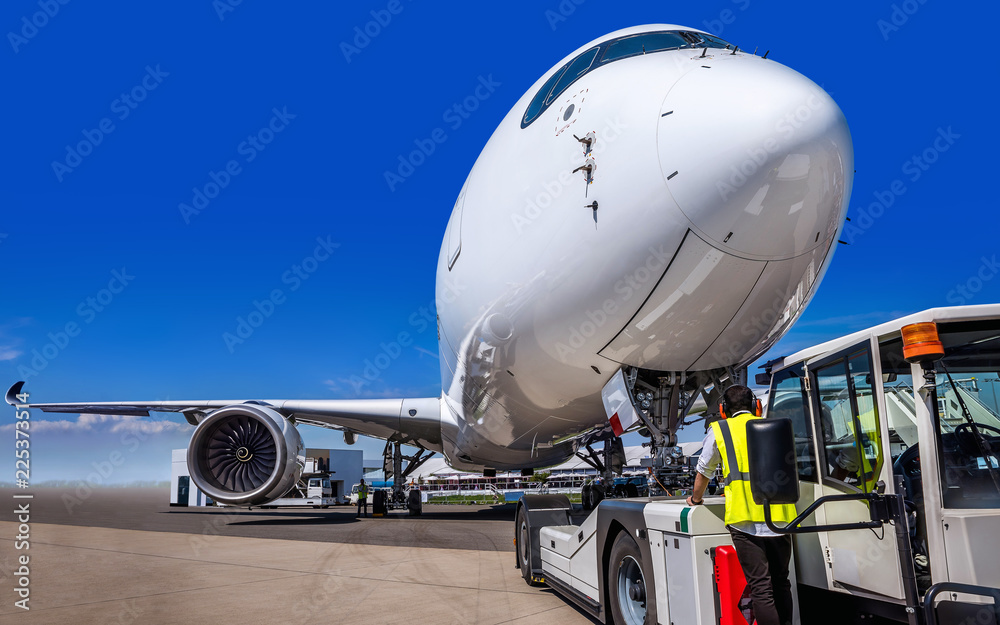 Fototapeta premium airplane getting prepared for take off