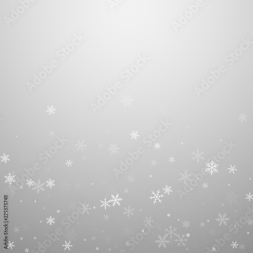 Sparse snowfall Christmas background. Subtle flyin