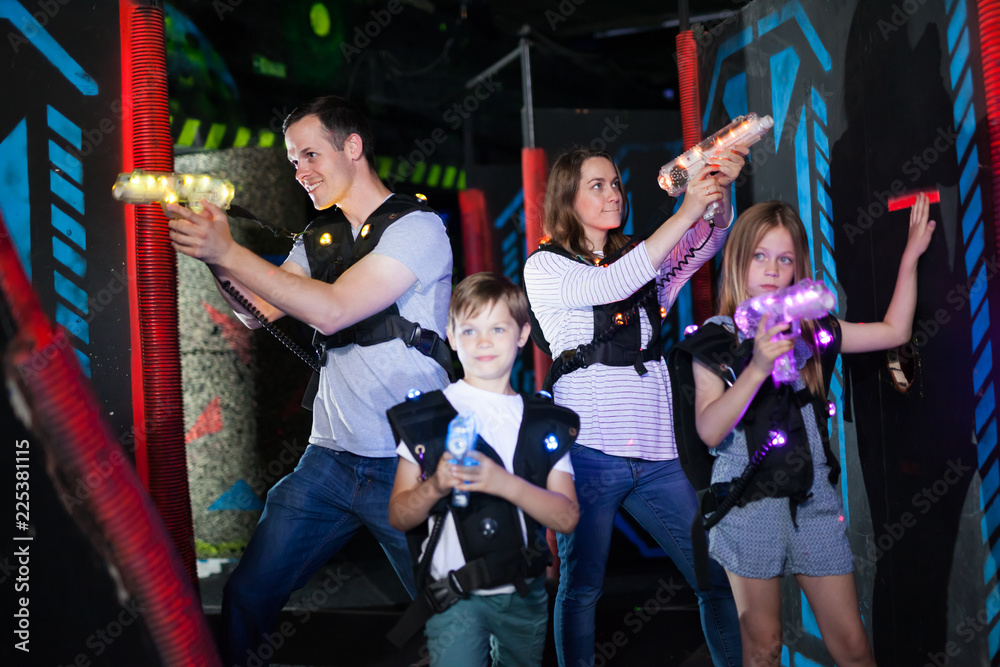Kids and adults on lasertag arena