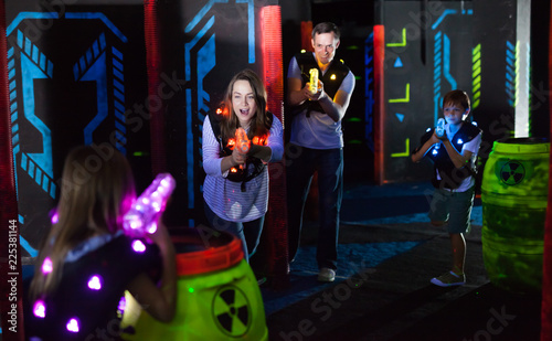 Kids and adults on lasertag arena