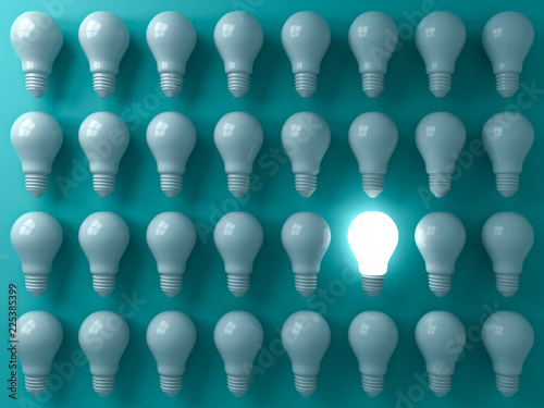 One glowing light bulb standing out from the unlit or dim bulbs on dark green pastel color background individuality and think different the business creative idea concepts 3D rendering