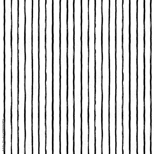Seamless pattern with hand drawn lines. Vector ink illustration. Grunge vertical lines.