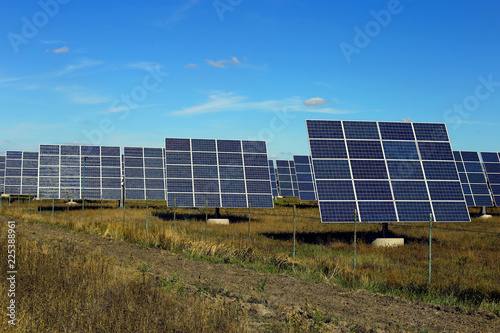 Solar panels against the blue sky, ecological power station.