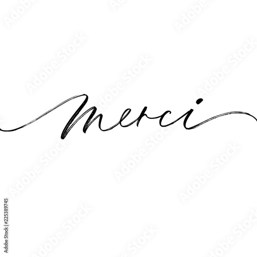 Merci phrase. Thank you in French. Modern vector brush calligraphy.  photo