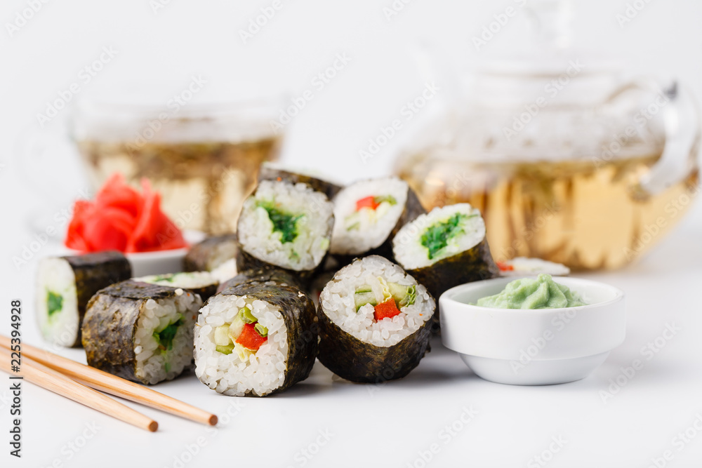 Served sets of sushi rolls with fish, rice,cream cheese and vegetables Served sets of sushi rolls with fish, rice,cream cheese and vegetables
