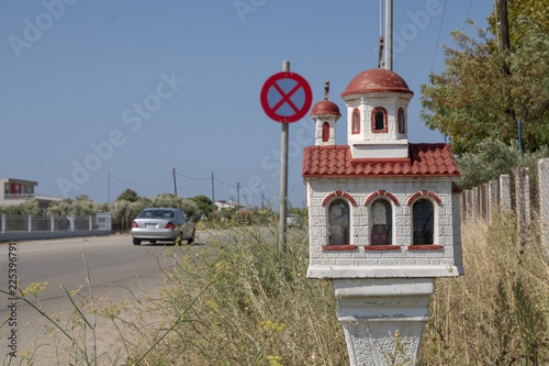 Traditional greek shrine on the roadside photo