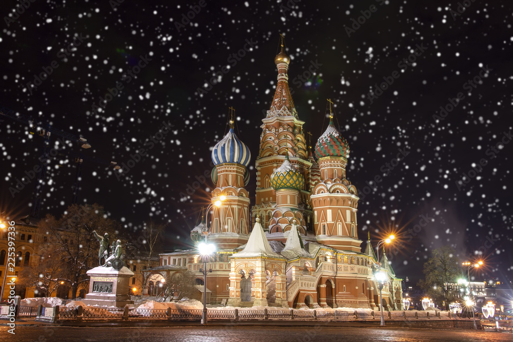 Snowy Moscow. St. Basil's Cathedral on Red Square in snowfall. Night cityscape of Moscow, Russia. Christmas and New Year time in Moscow